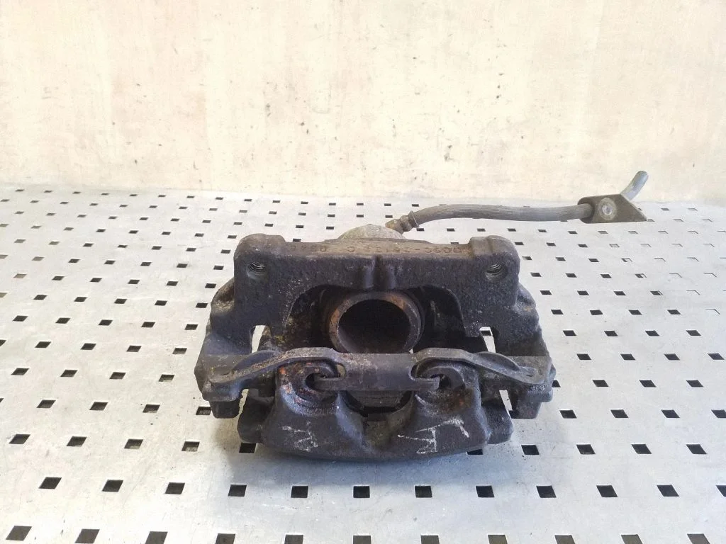 Front brake caliper DG9C2B134C