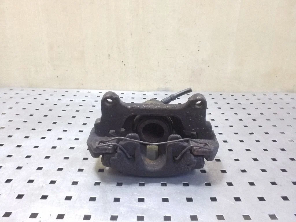 Front brake caliper – right