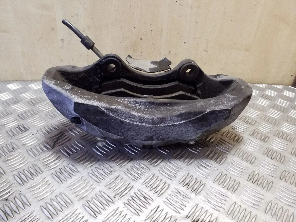 Front brake caliper 20A6470600