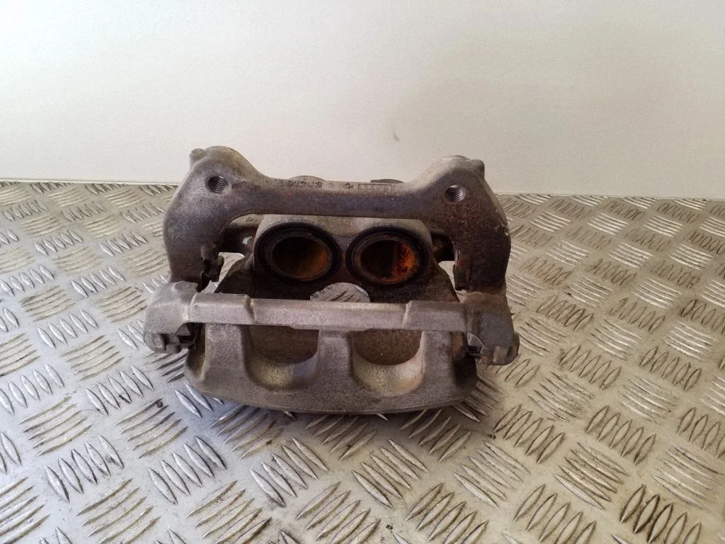 Front brake caliper M8D22B119AA