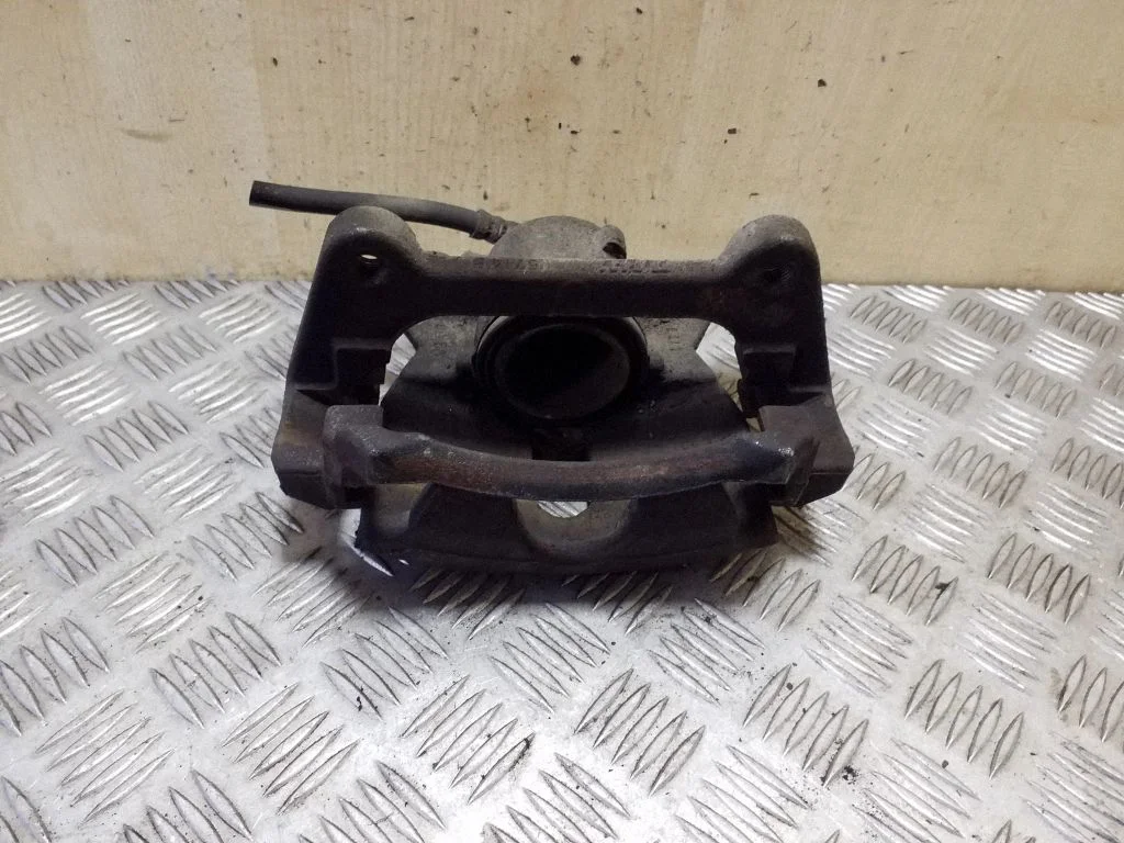 Front brake caliper – left