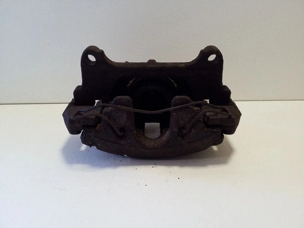 Front brake caliper – left