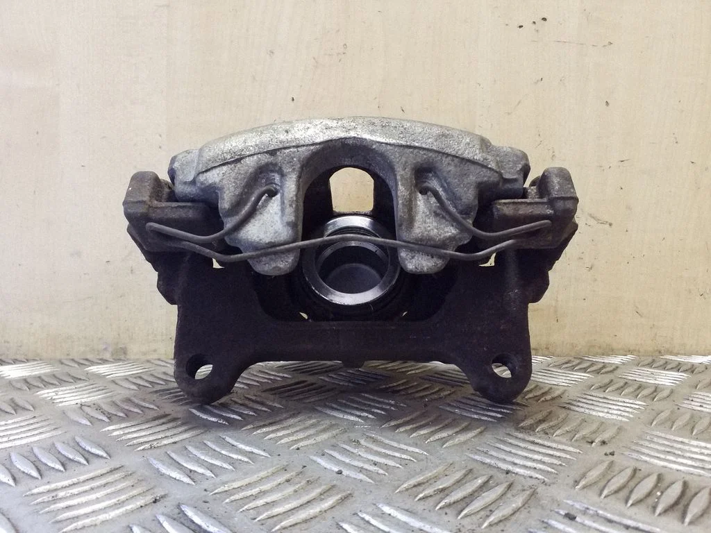 Front brake caliper – left