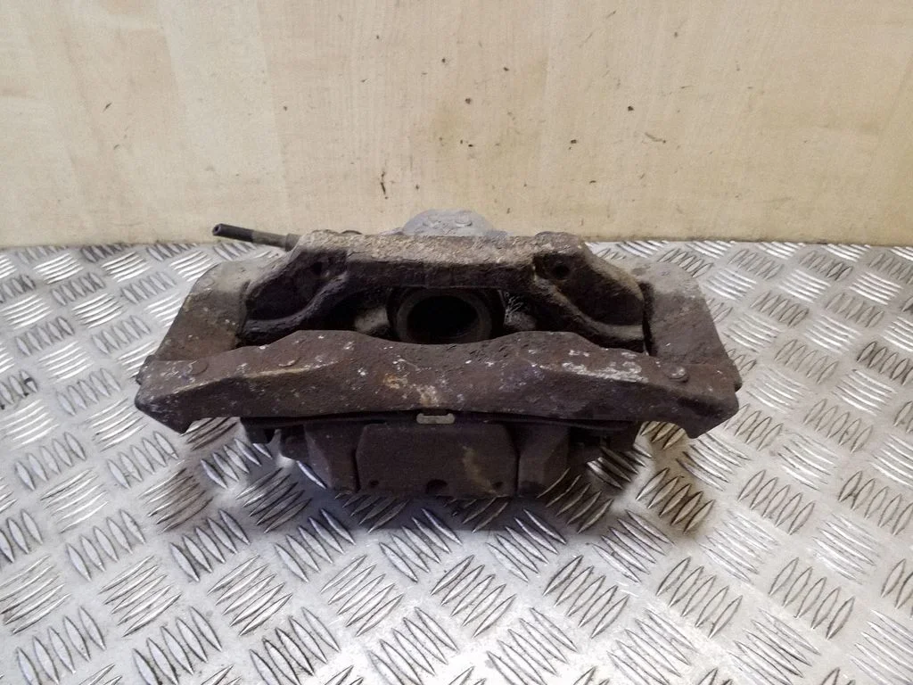 Front brake caliper – right