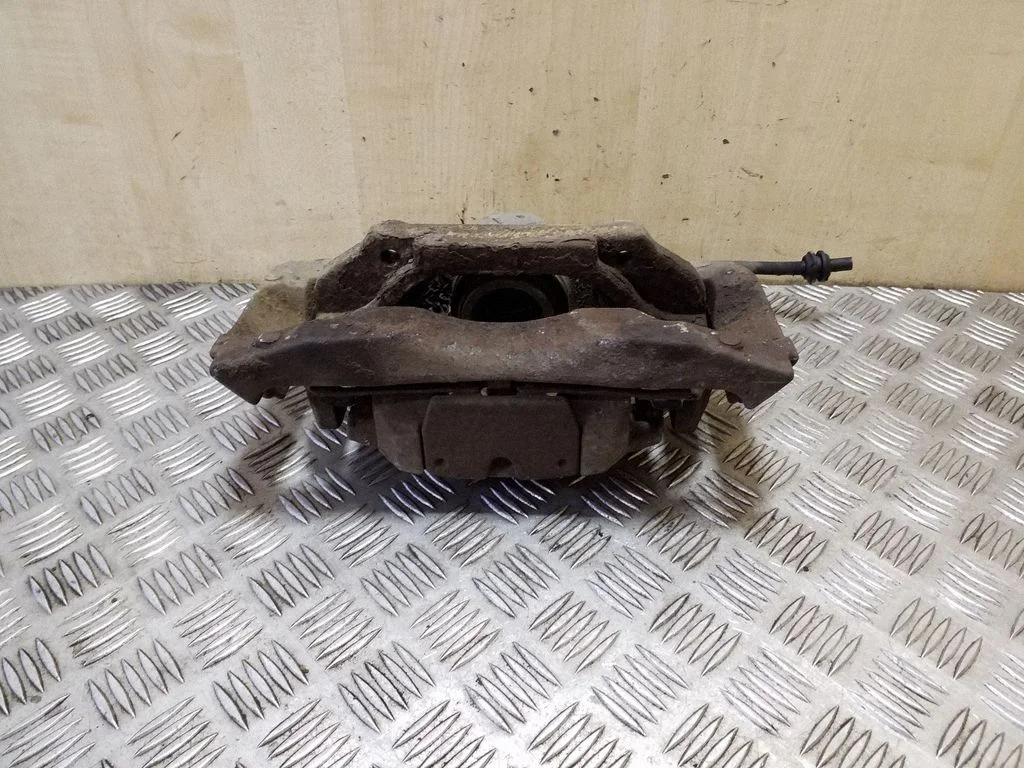 Front brake caliper – left