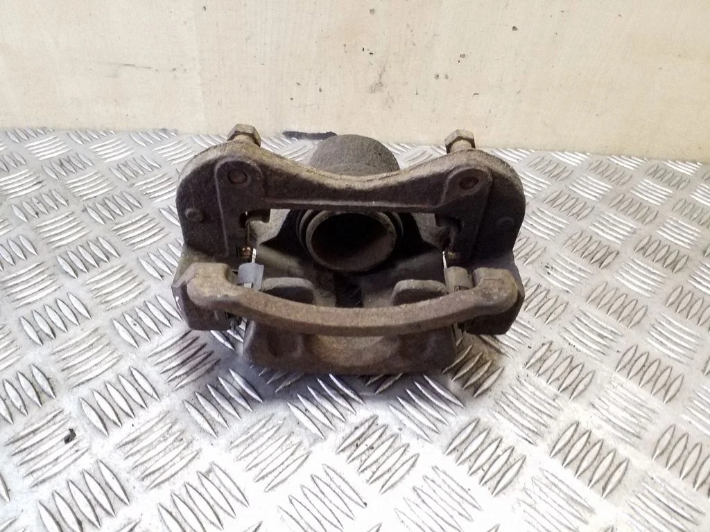 Front brake caliper – left