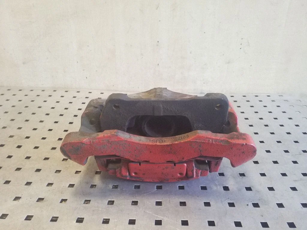 Front brake caliper – left