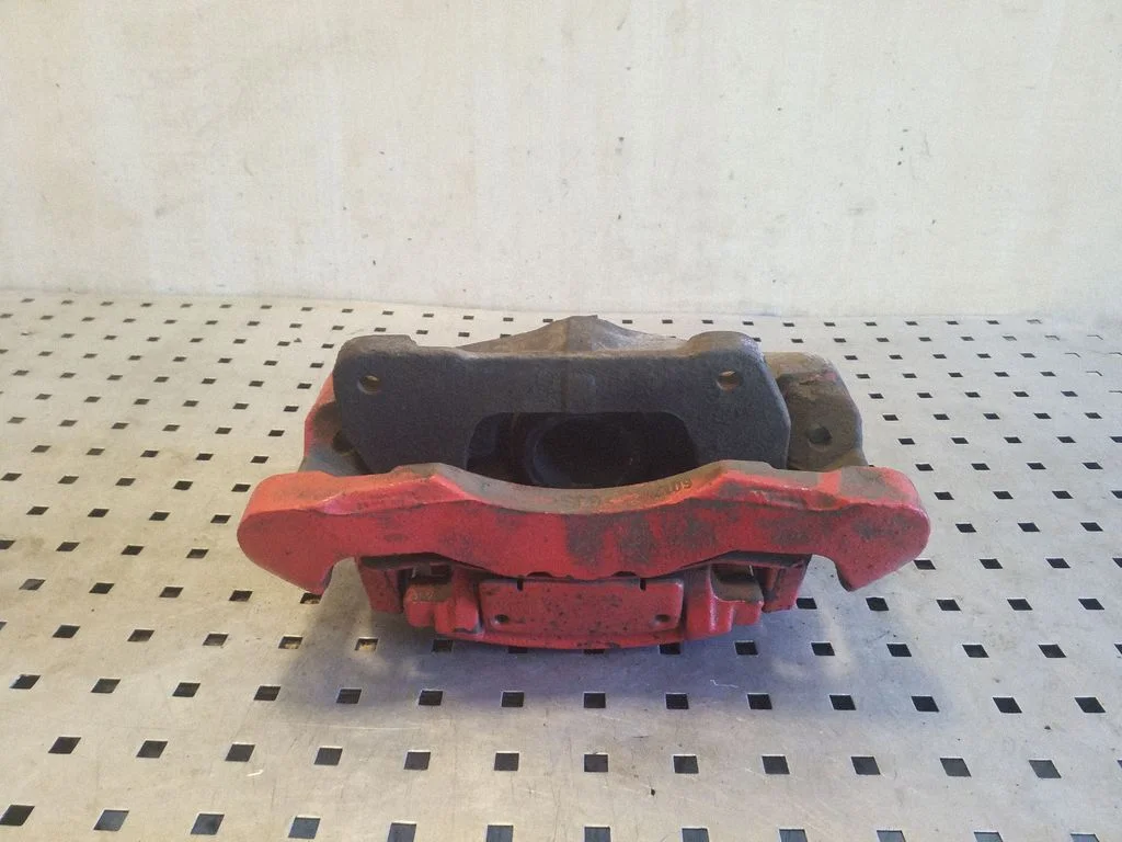 Front brake caliper – right
