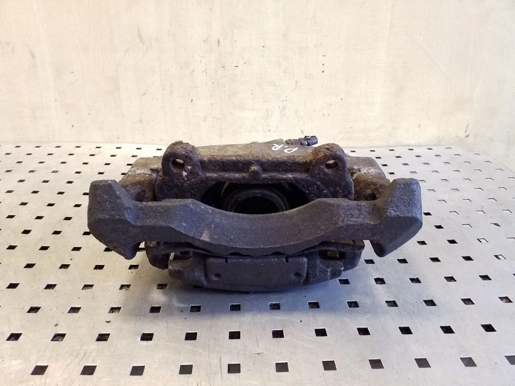 Front brake caliper – right