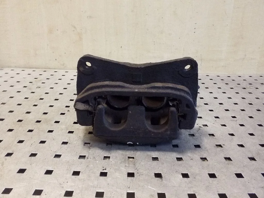 Front brake caliper – left