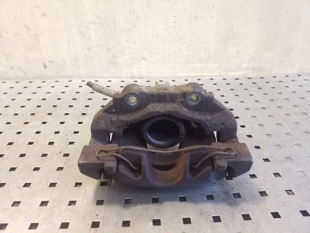 Front brake caliper – left