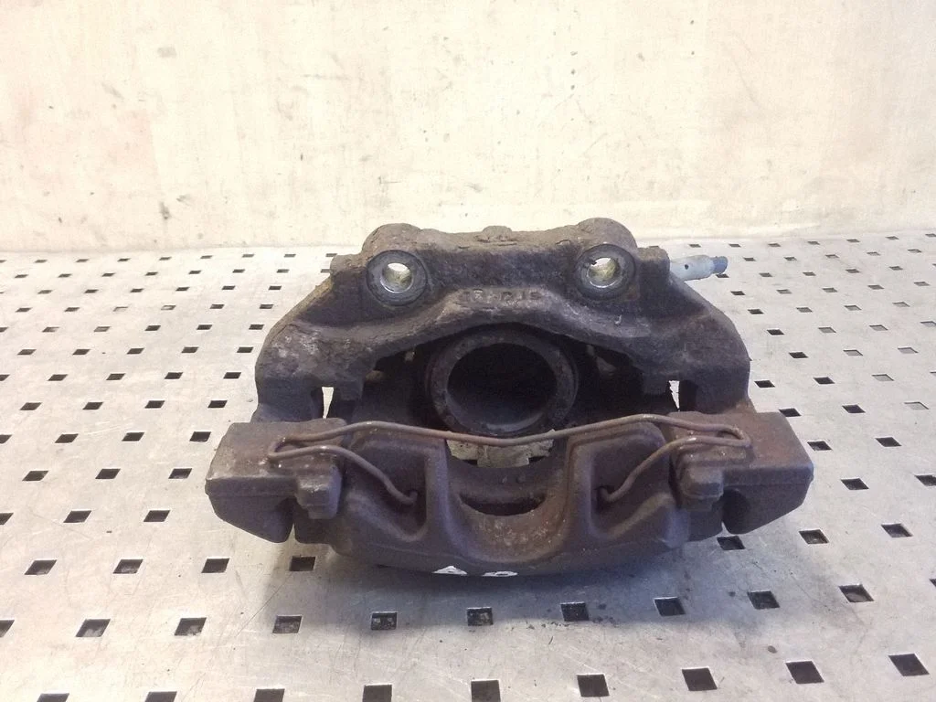 Front brake caliper – right
