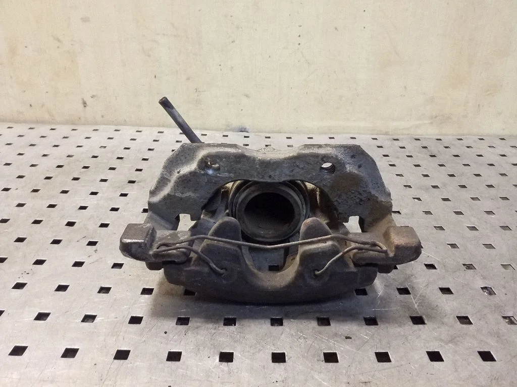 Front brake caliper – Ford Focus (2010-2017), left