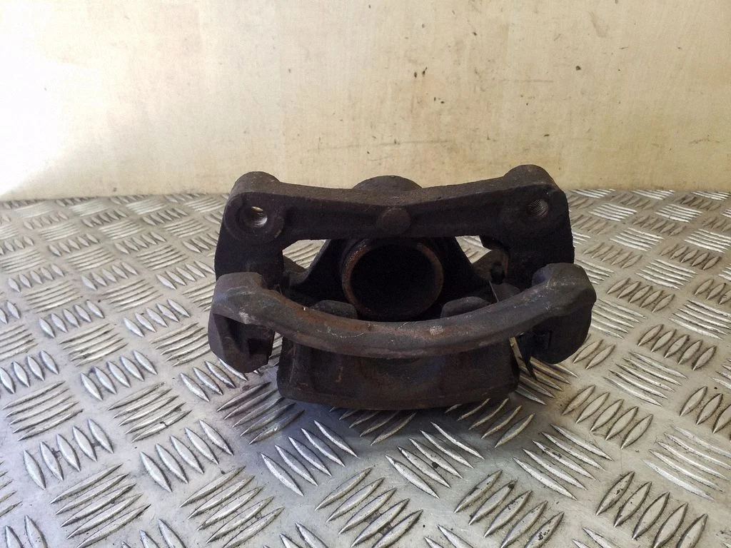 Front brake caliper – left