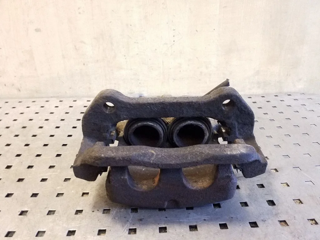 Front brake caliper – left