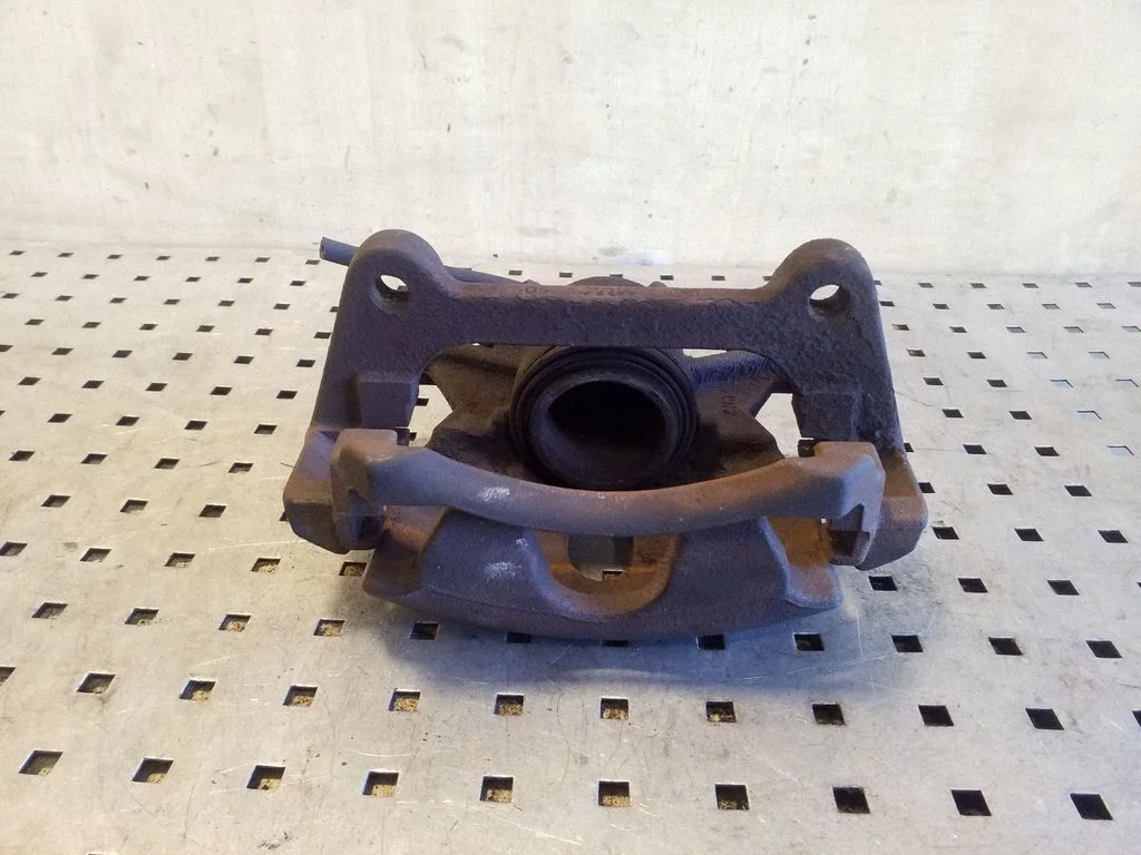 Front brake caliper – left