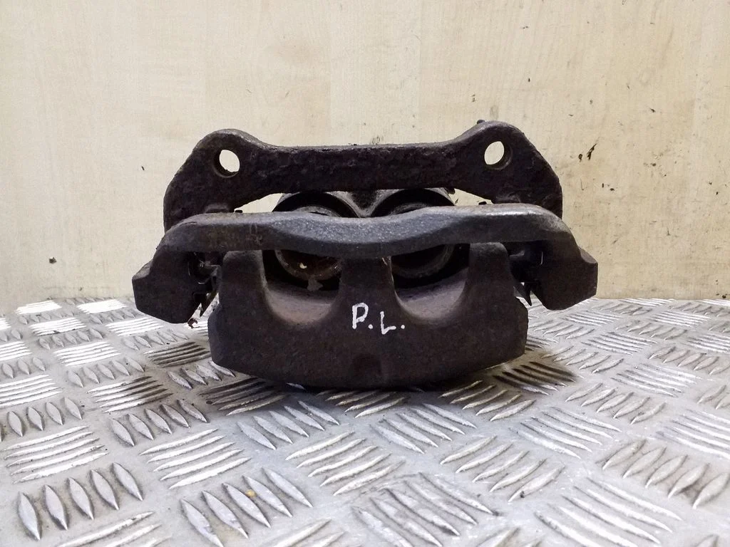 Front brake caliper – left