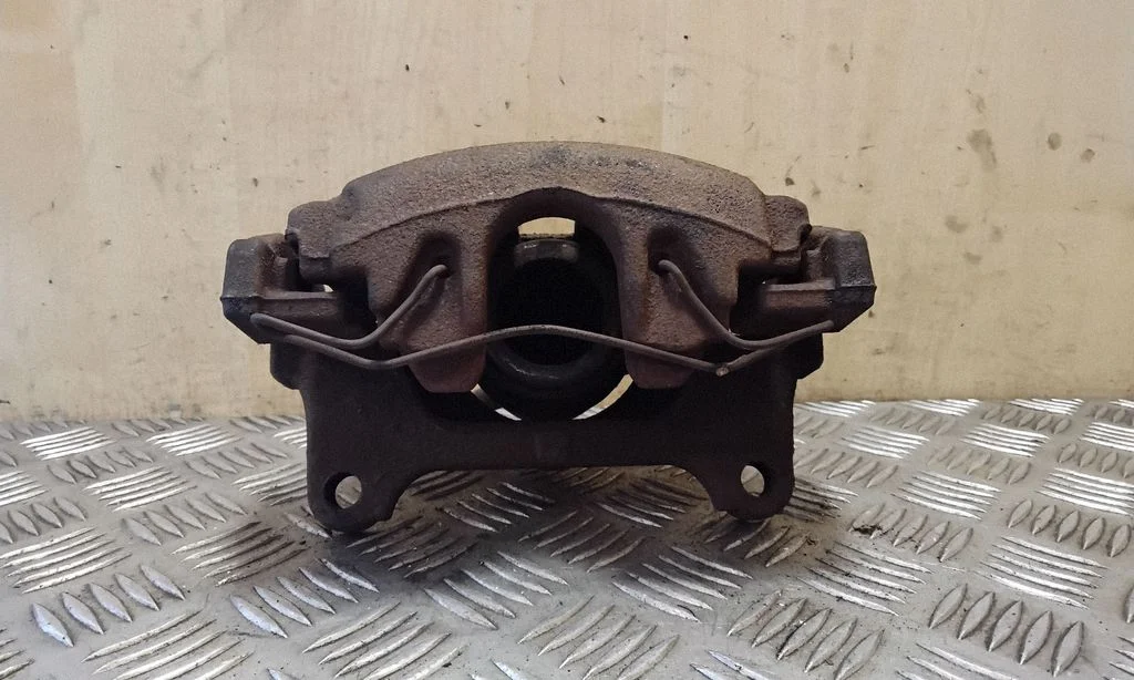 Front brake caliper – right