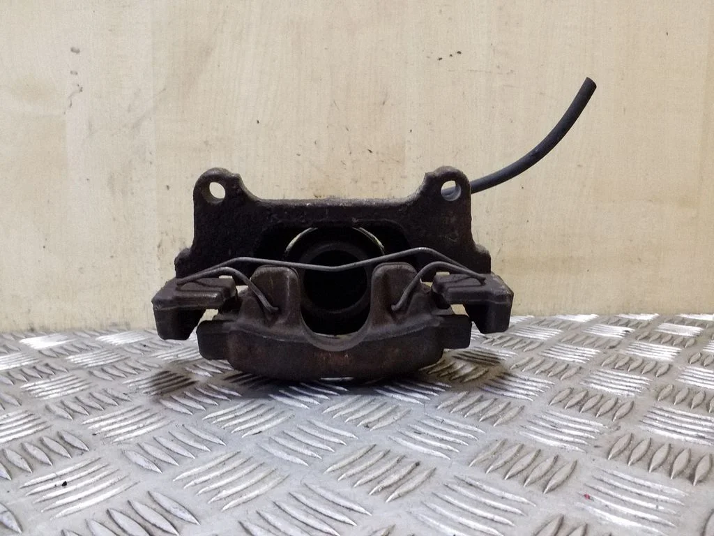 Front brake caliper – right