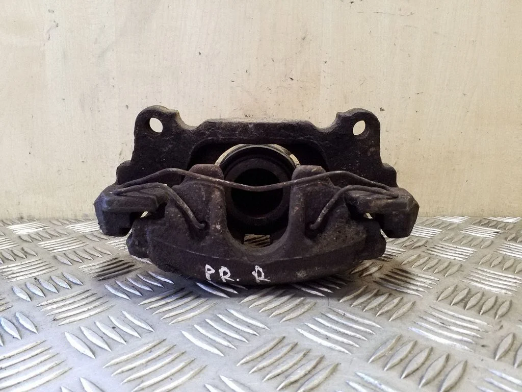 Front brake caliper – right