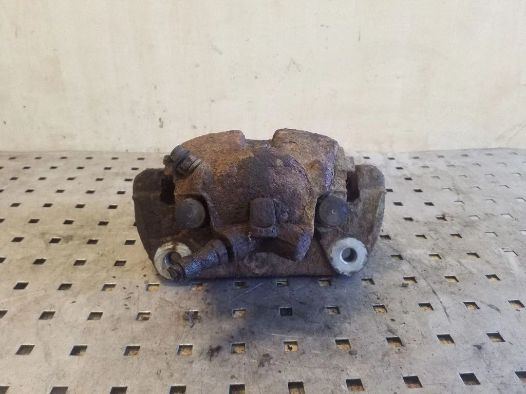 Front brake caliper – right
