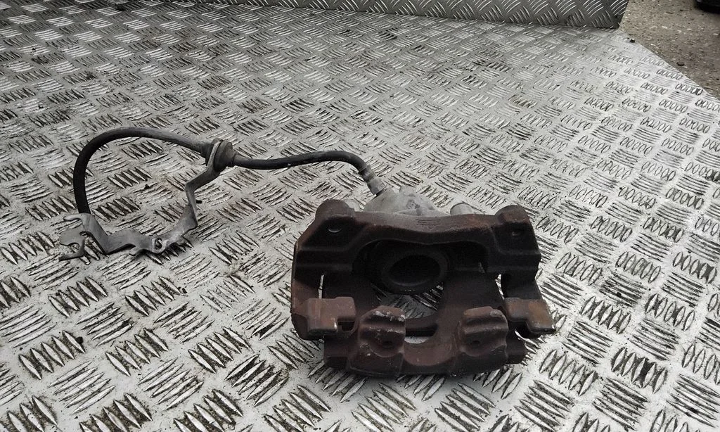Front brake caliper – Renault Scenic III - Grand scenic III (2009-2016), left