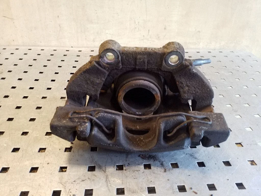 Front brake caliper – right