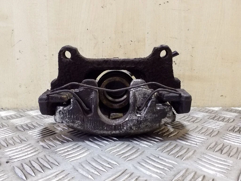 Front brake caliper – right