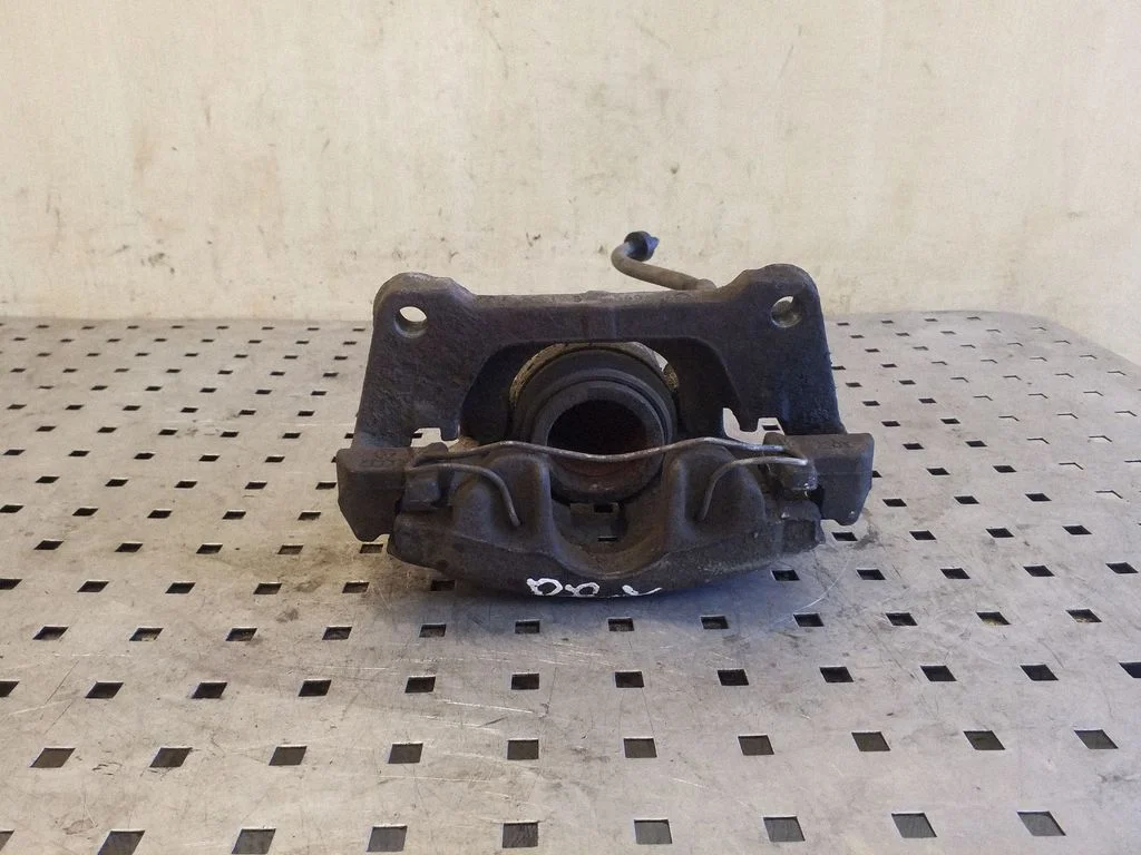 Front brake caliper – left