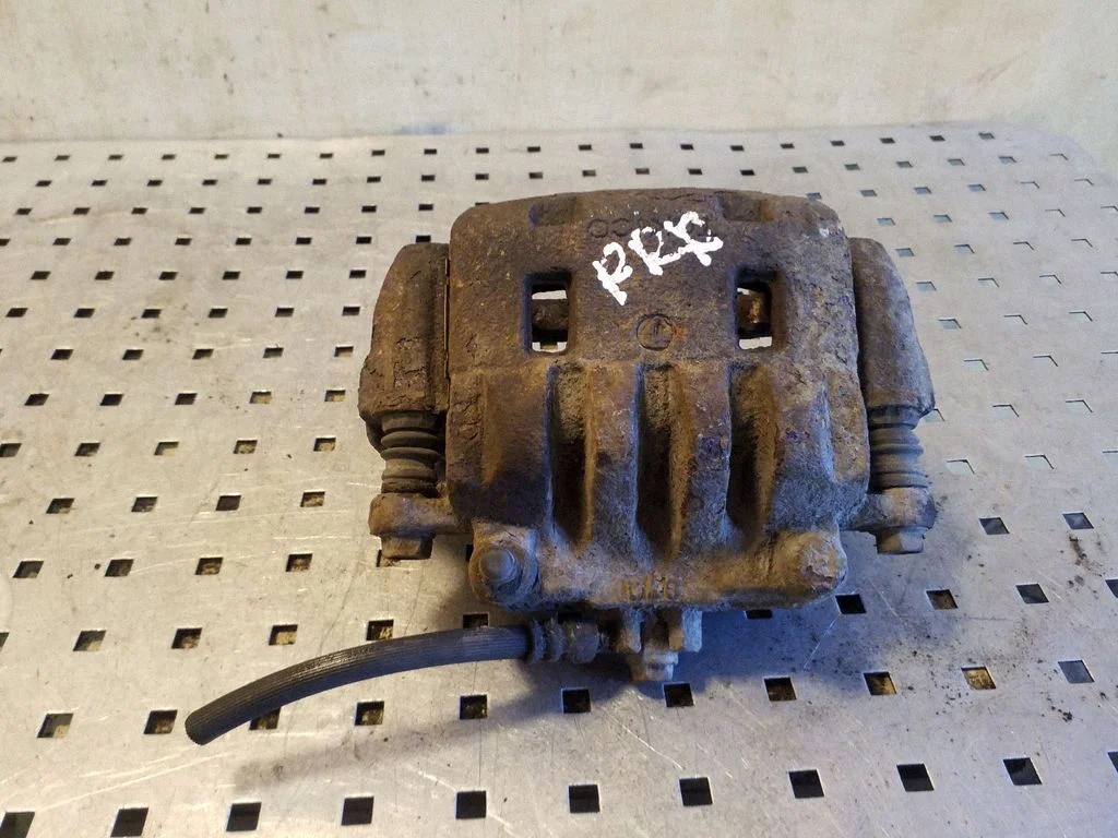 Front brake caliper – right
