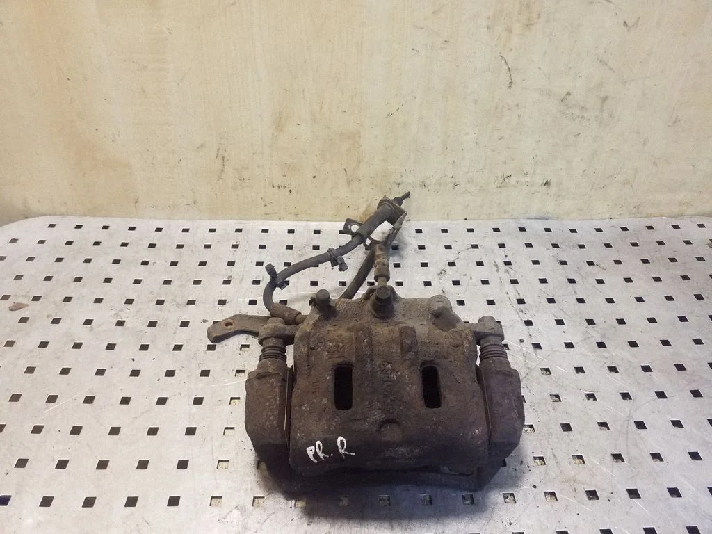 Front brake caliper – right
