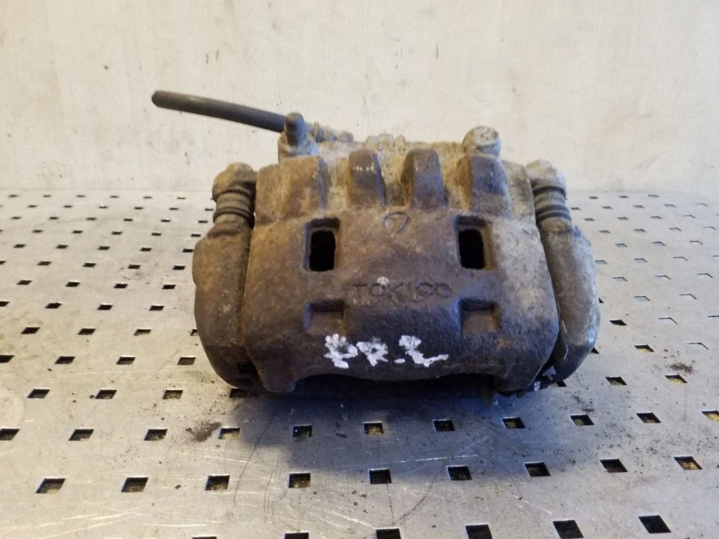 Front brake caliper – left