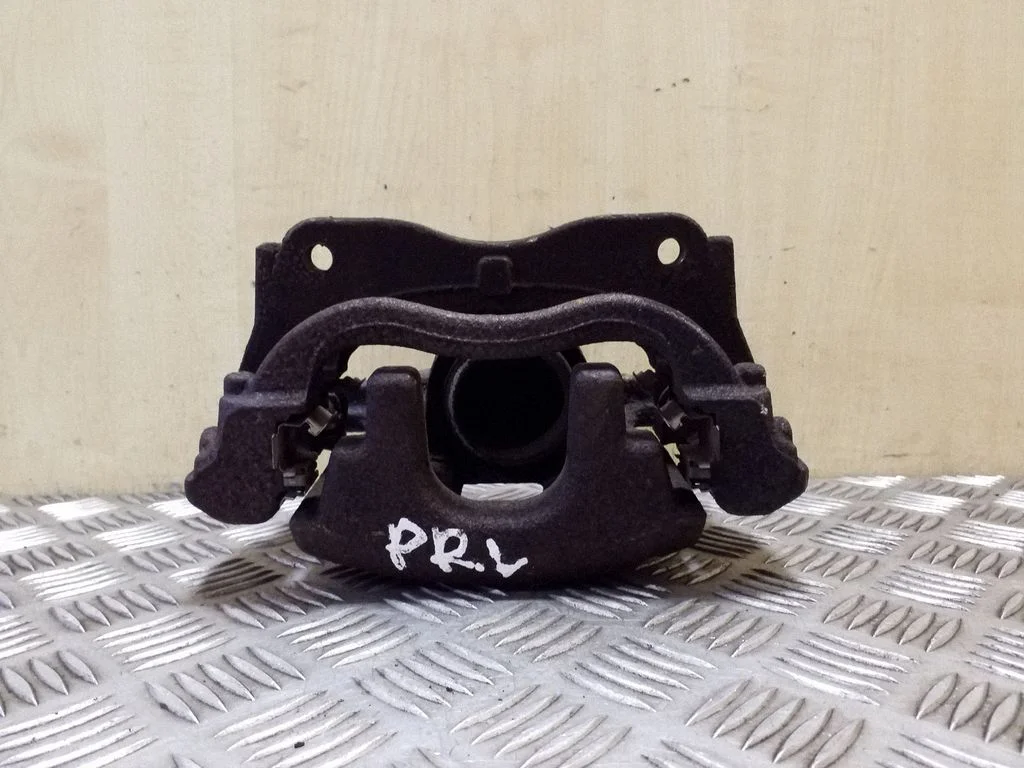 Front brake caliper – left