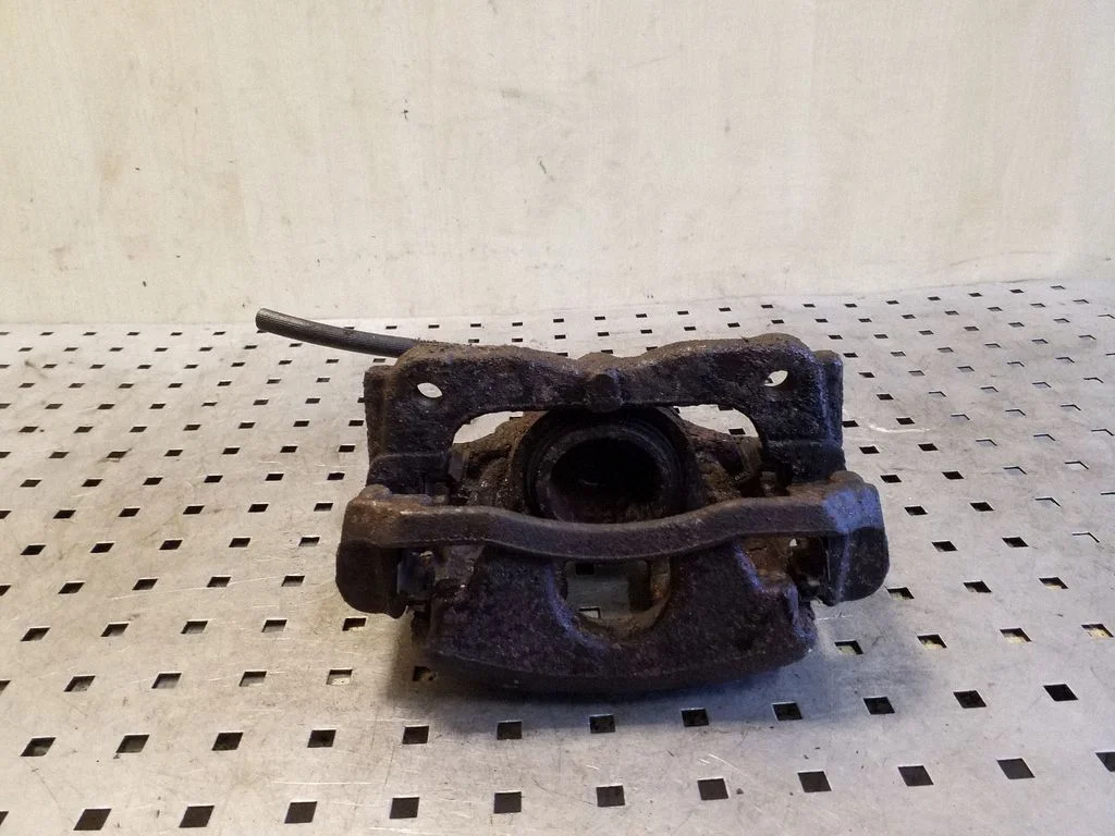 Front brake caliper – left