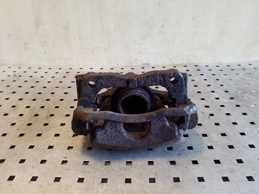 Front brake caliper – left