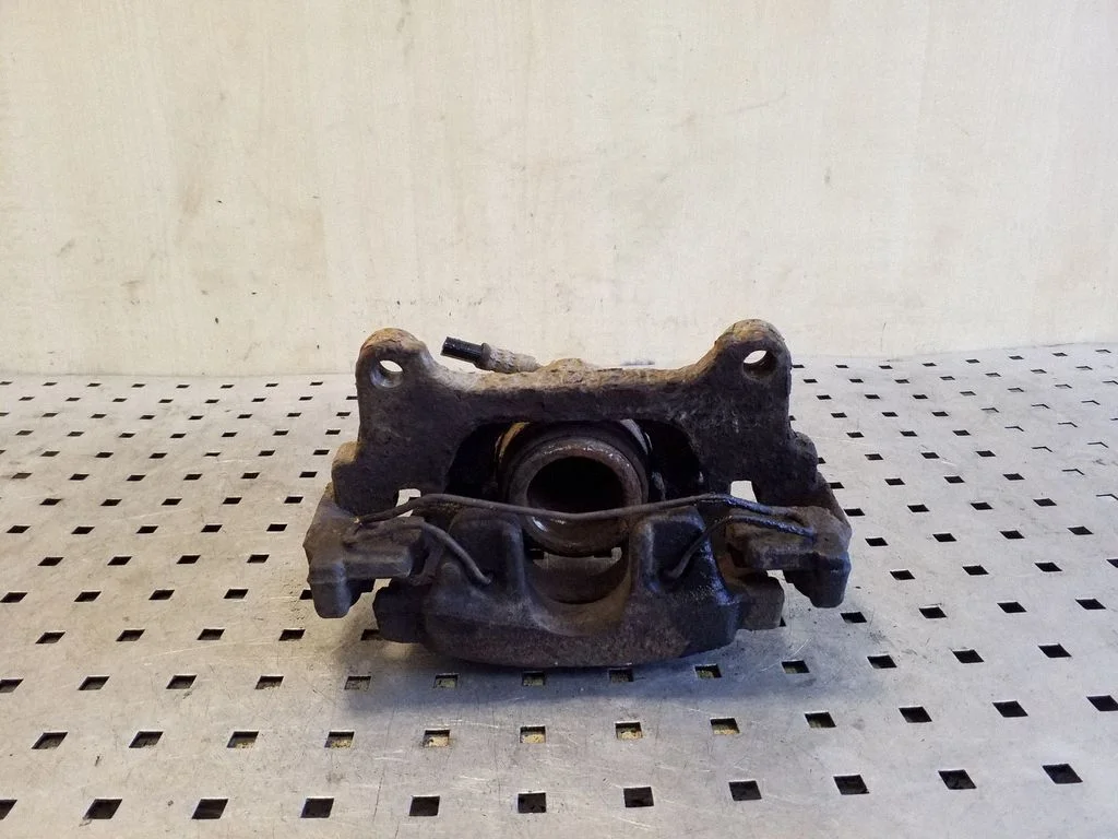 Front brake caliper – left
