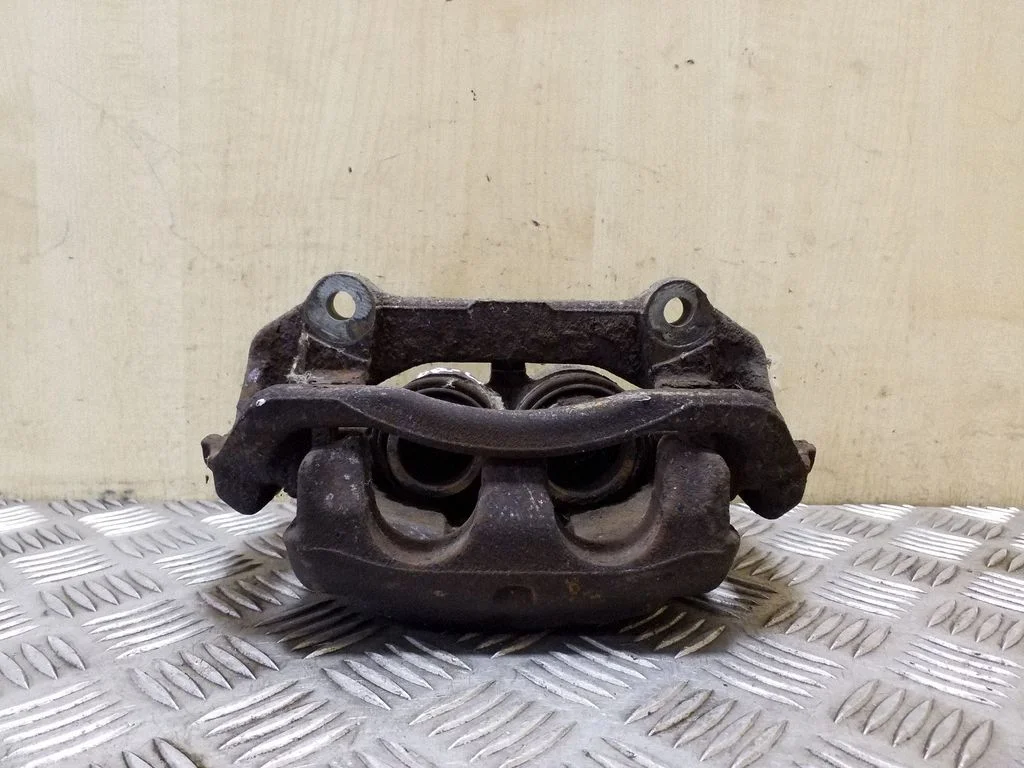 Front brake caliper – left