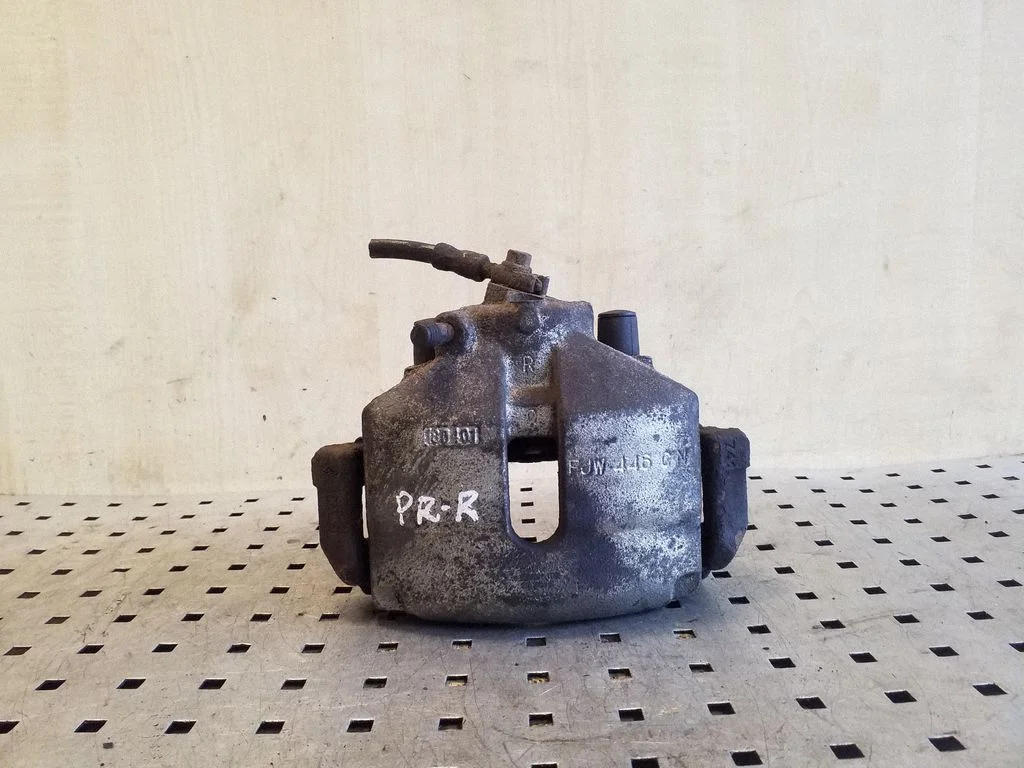 Front brake caliper – right