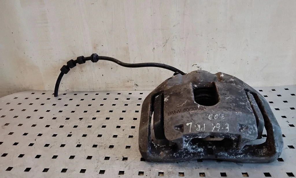 Front brake caliper – left