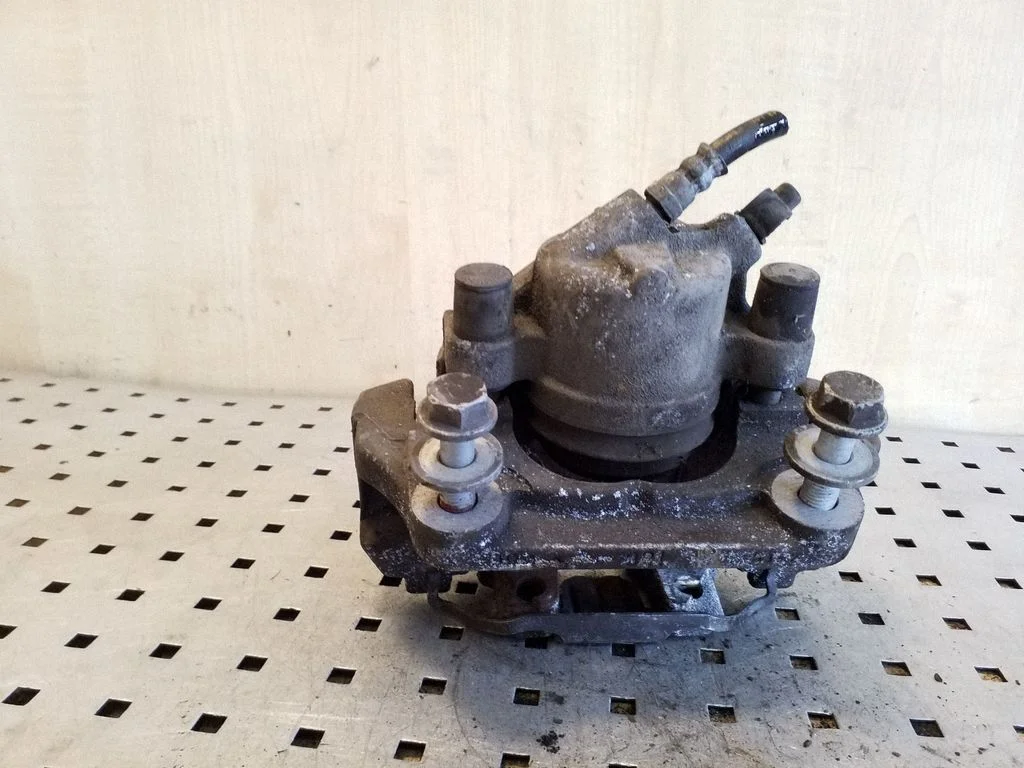 Front brake caliper – front left
