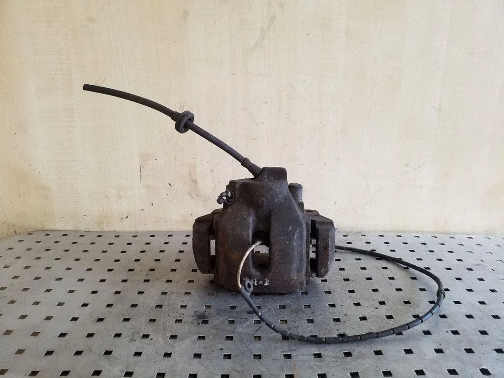 Front brake caliper – front left