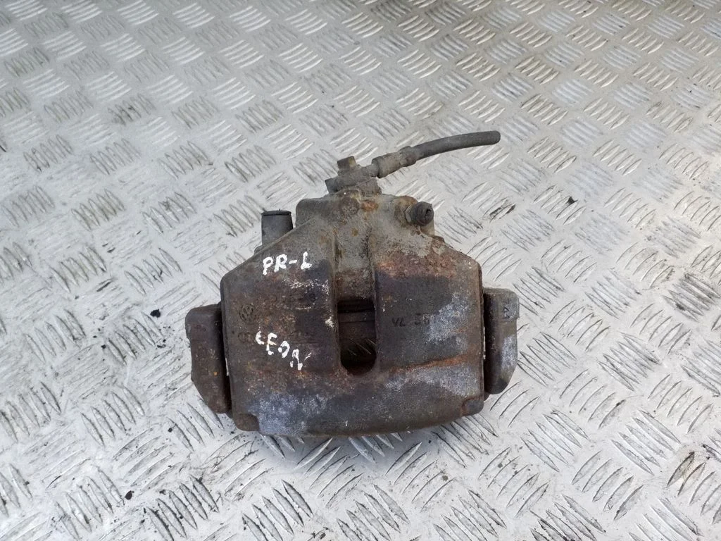 Front brake caliper – left