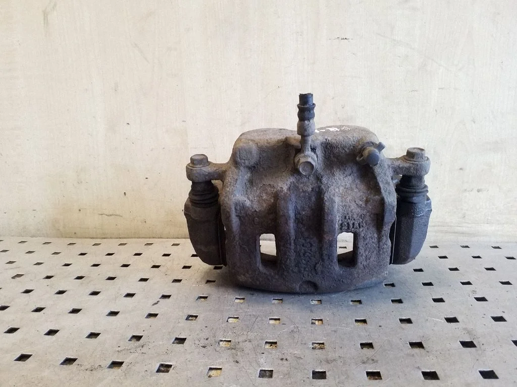 Front brake caliper – front left