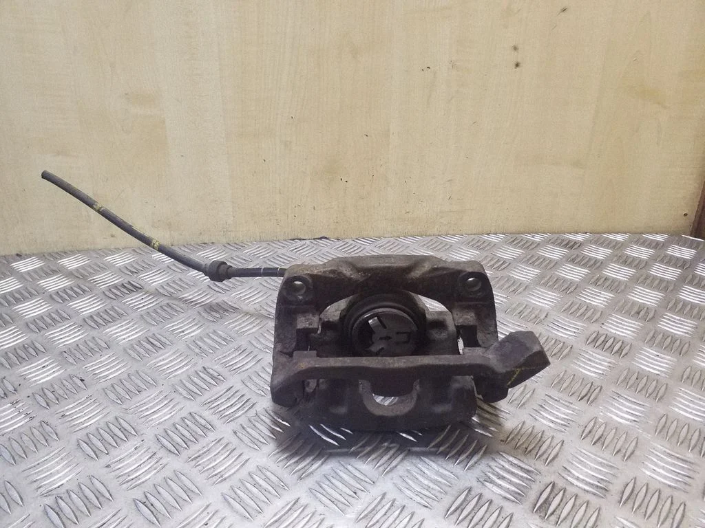 Front brake caliper – Renault Scenic I (1996-2003), left