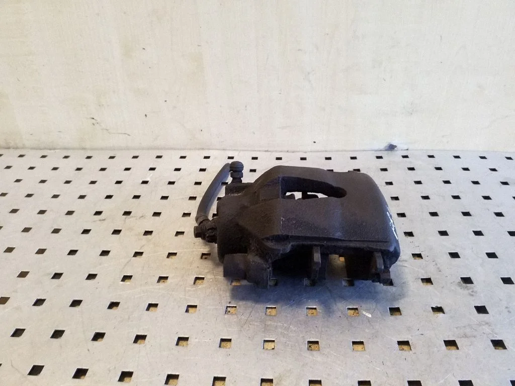 Front brake caliper – front left