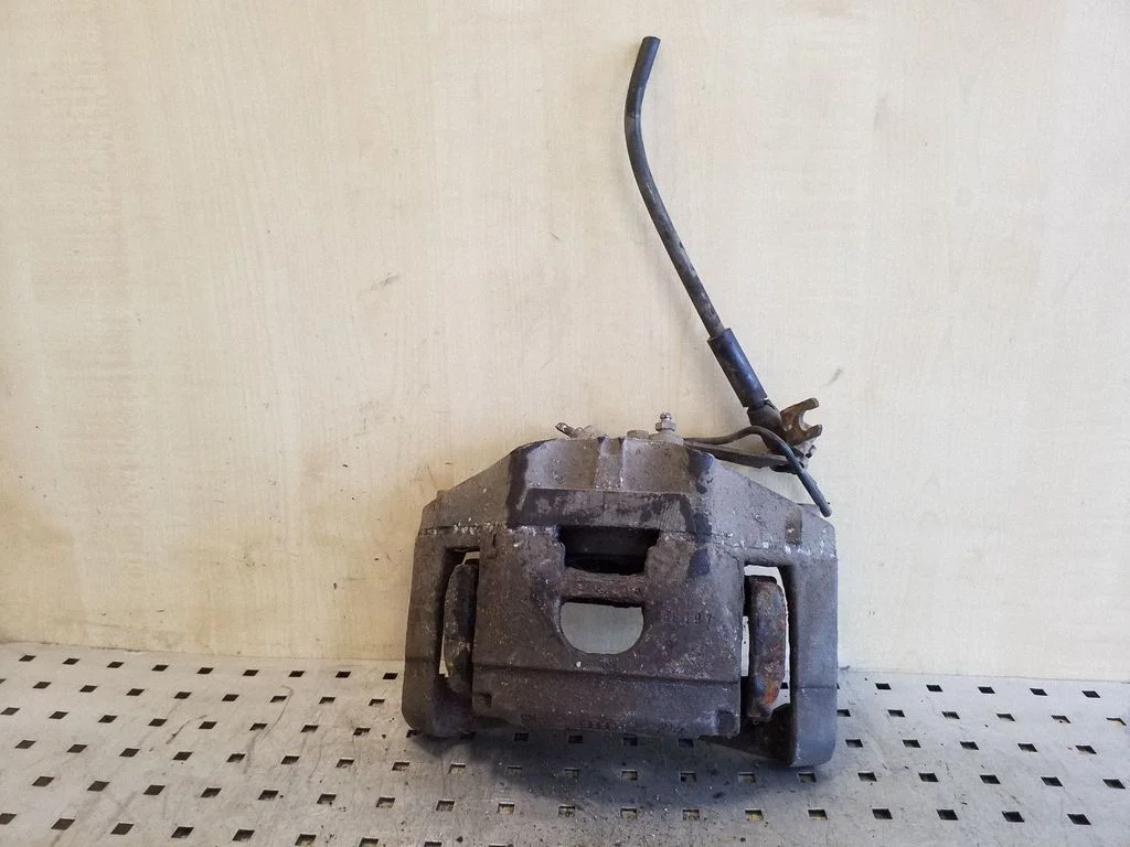 Front brake caliper – front right