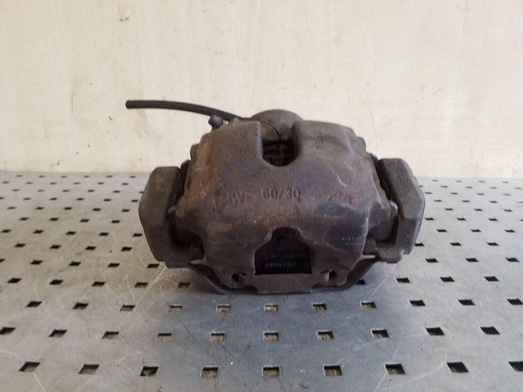 Front brake caliper – front left