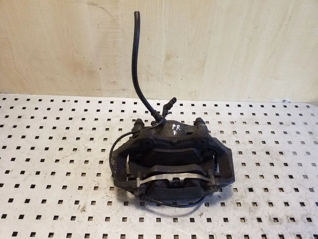 Front brake caliper – right