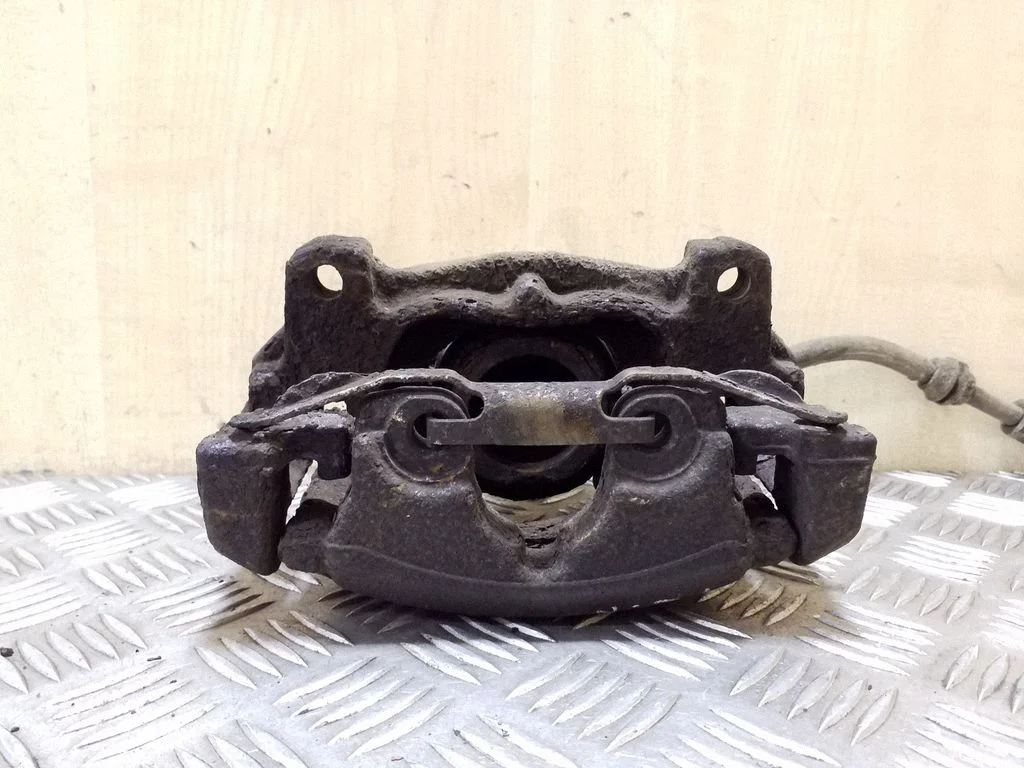 Front brake caliper – right