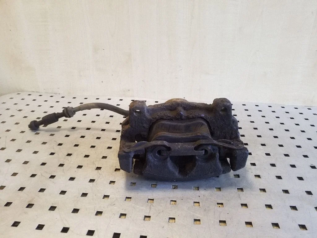 Front brake caliper – front left
